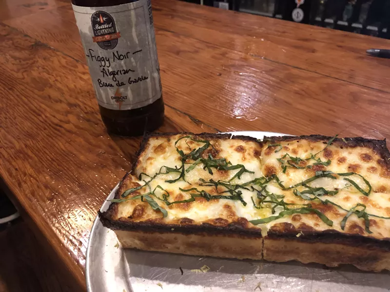 Image: One of the new pies at Crush Pizza + Tap, the Lemon Margherita.
