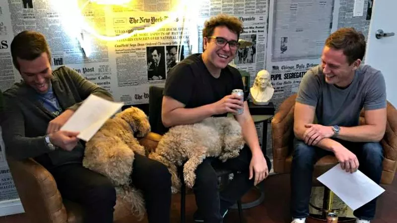 Image: Jon Favreau, Jon Lovett and Tommy Vietor (from left), along with their much-talked-about goldendoodle puppies, prior to a recent video shoot.