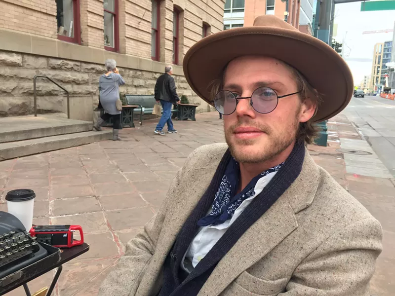 Image: Poet Devan Michael Kingsford spotted outside of the downtown Tattered Cover.