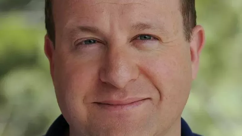 Image: Governor Jared Polis provided a COVID-19 update during a March 11 press conference.