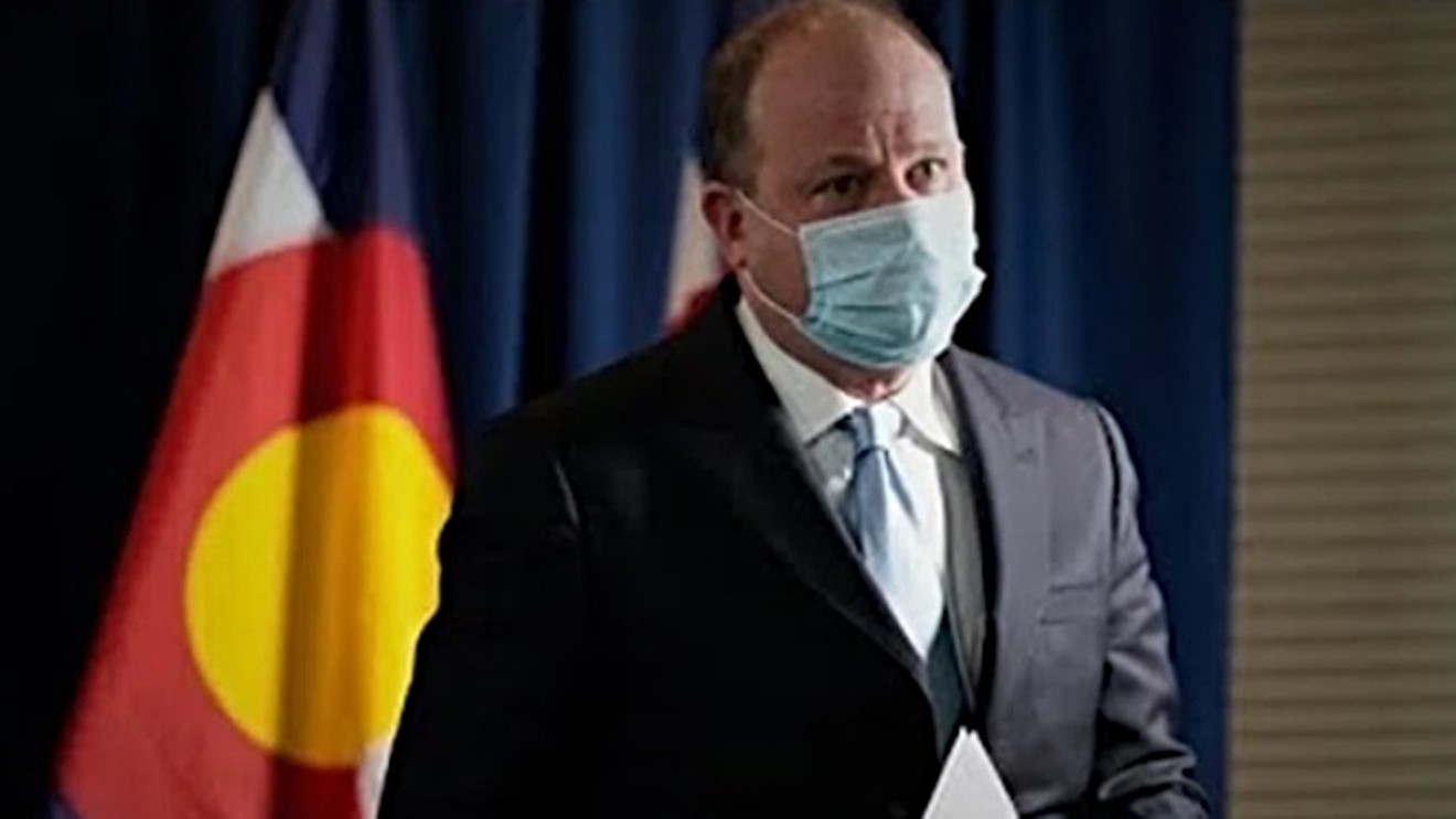 A masked portrait of Governor Jared Polis.