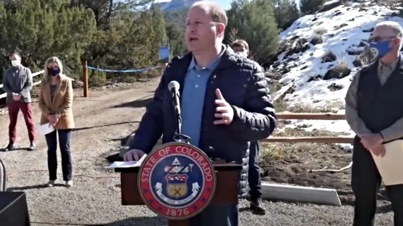 Image: Governor Jared Polis during a recent press conference introducing Fishers Peak State Park.