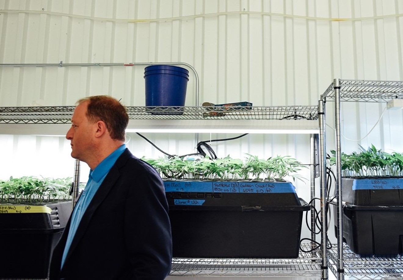 Governor Jared Polis tours a commercial marijuana grow during his days as a congressman in 2018.