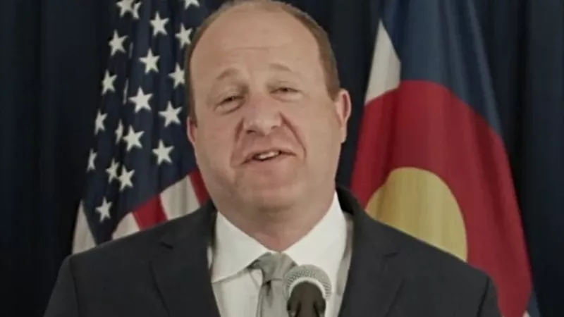 Image: Colorado Governor Jared Polis during a May press conference, when he announced that unvaccinated people no longer had to wear masks at public places.