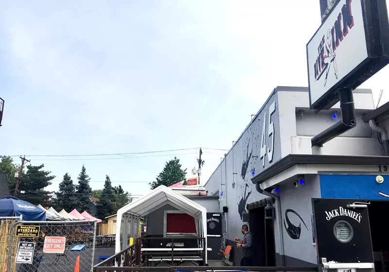 Image: The Dive Inn's owner, Jason Tietjen, says drinking and politics don't mix on his expanded patios.