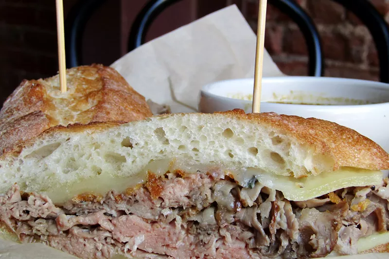 Image: The Frenchie sandwich, with roast beef, crispy onions, Gruyère and French onion soup.