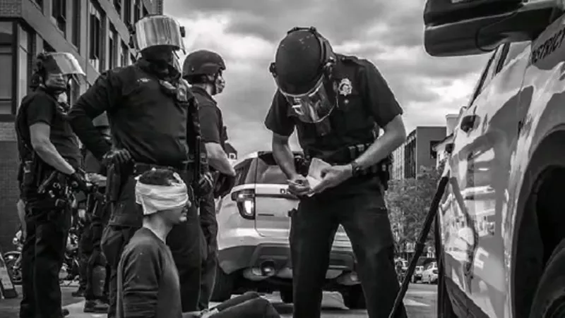 Image: Michael Acker after being shot in the eye during a May 2020 Denver protest.