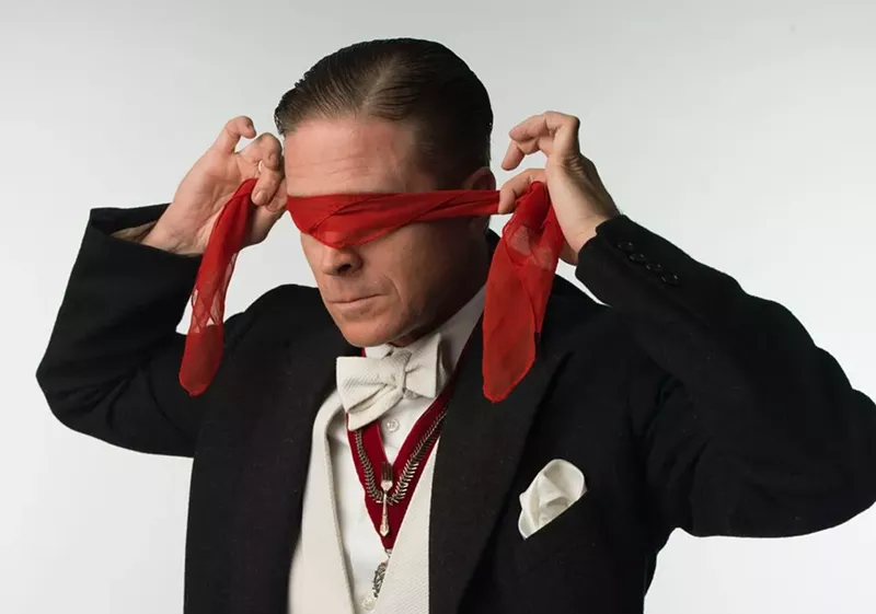 Image: Mentalist Professor Phelyx dons a blindfold.