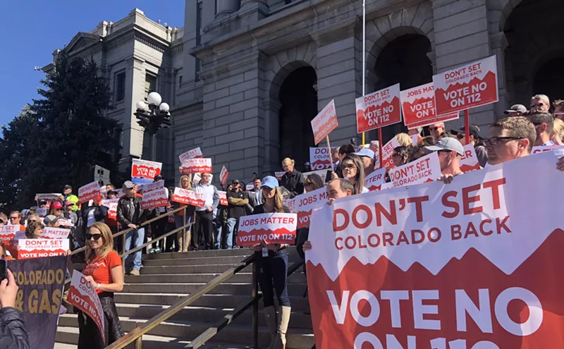 Image: Proposition 112 Opponents Rally at State Capitol as Proponents Cancel Event After Threats