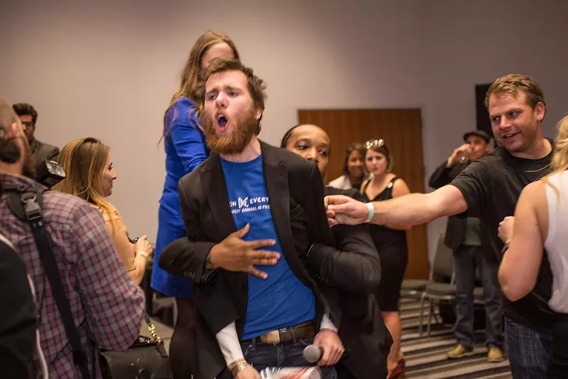 Image: Protestors briefly interrupt Cochon555 at the Curtis.