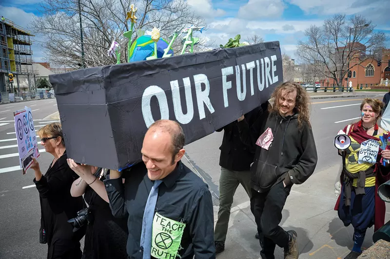 Image: A mock funeral procession — similar to this one protesting a lack of climate change action — will call attention to unemployed restaurant and union workers.