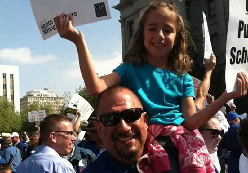 Image: The late Dorian DeLong and his daughter.