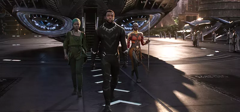 Image: T'Challa/Black Panther, King of Wakanda, along with Nakia (left) and Okoye (right).