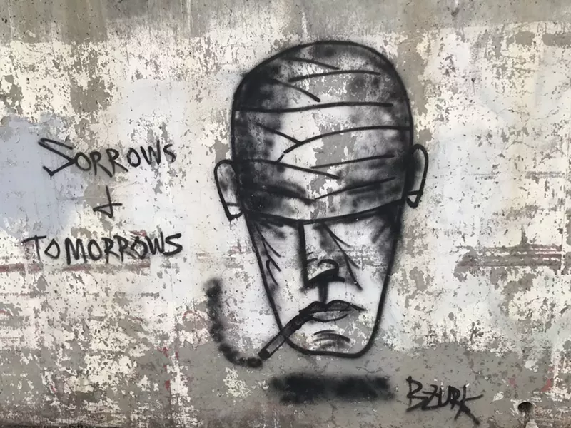 Image: This graffiti piece by Bark was found alongside the Sand Creek Trail.