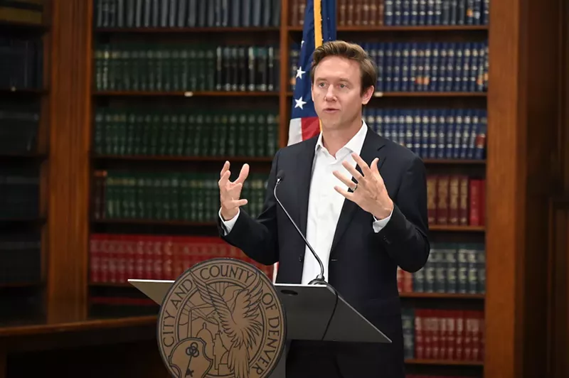 Image: Denver Mayor Mike Johnston talks to the press about a planned homeless sweep in the Parr-Widener Room.