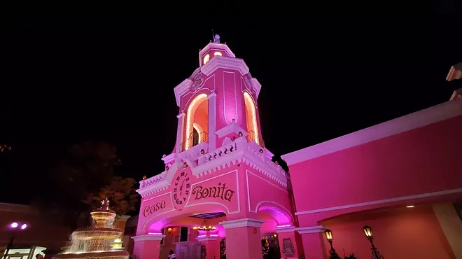 casa bonita pink restaurant at night