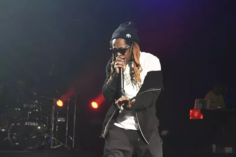 Image: Lil Wayne entertaining the Colorado crowd on 4/20.