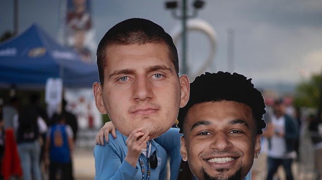 nuggets fans with jokic and murray masks