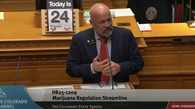 Senator speaks at podium before bill vote