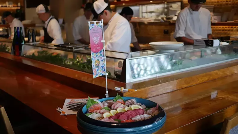 Image: sushi chef and sushi