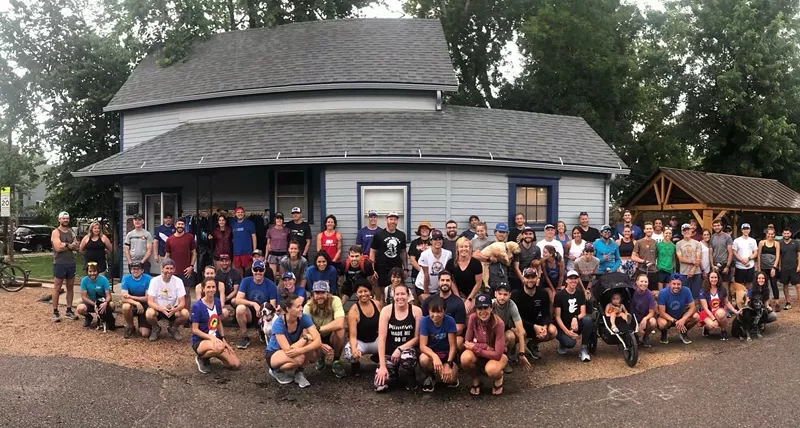 Image: Runners gathered outside the Berkeley Park Running Company on Thursday, June 24, to say goodbye to the beloved building.