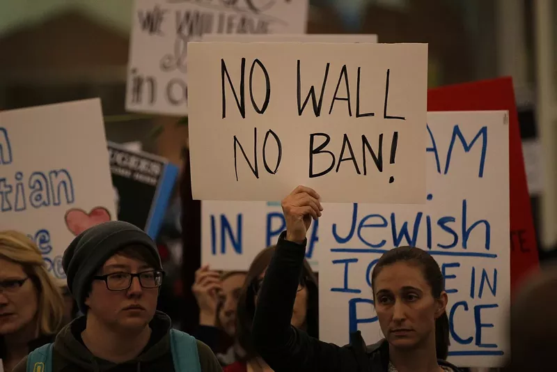 Image: Protesters at Denver International Airport this weekend.