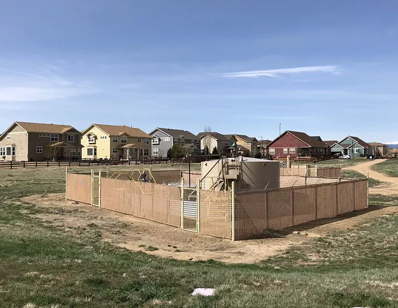 Image: An oil and gas facility near homes in Erie.