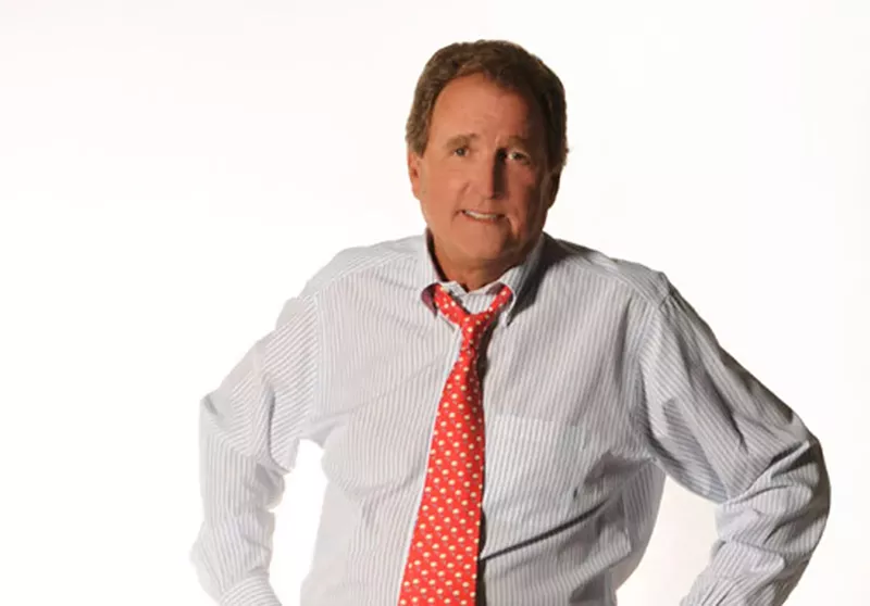 Image: man in shirtsleeves and tie