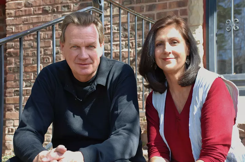 Image: man and woman on steps