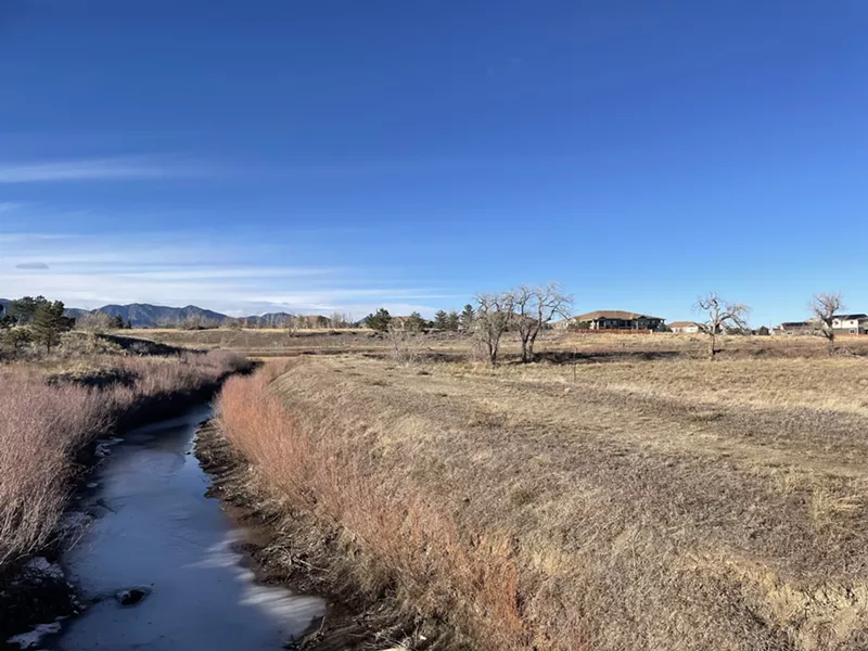 Image: The proposed development site backs up to a neighborhood.