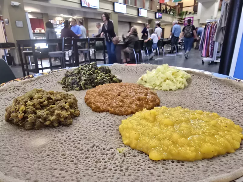 Image: ethiopian injera bread topped with various veggie dishes