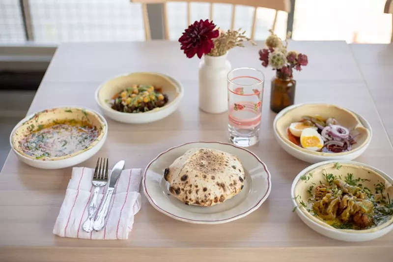 Image: Fresh-baked pita and other Israeli dishes await at Safta.