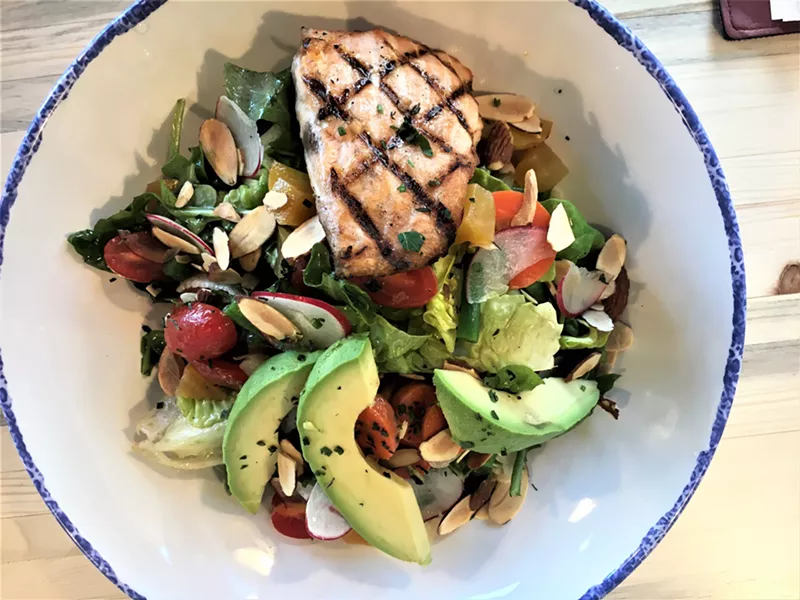Image: Hilltop neighbors can now enjoy this grilled salmon salad at the Rotary.