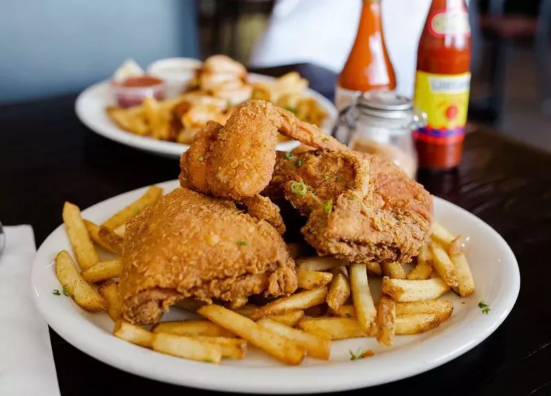 Image: a plate of fried chicken and french fries