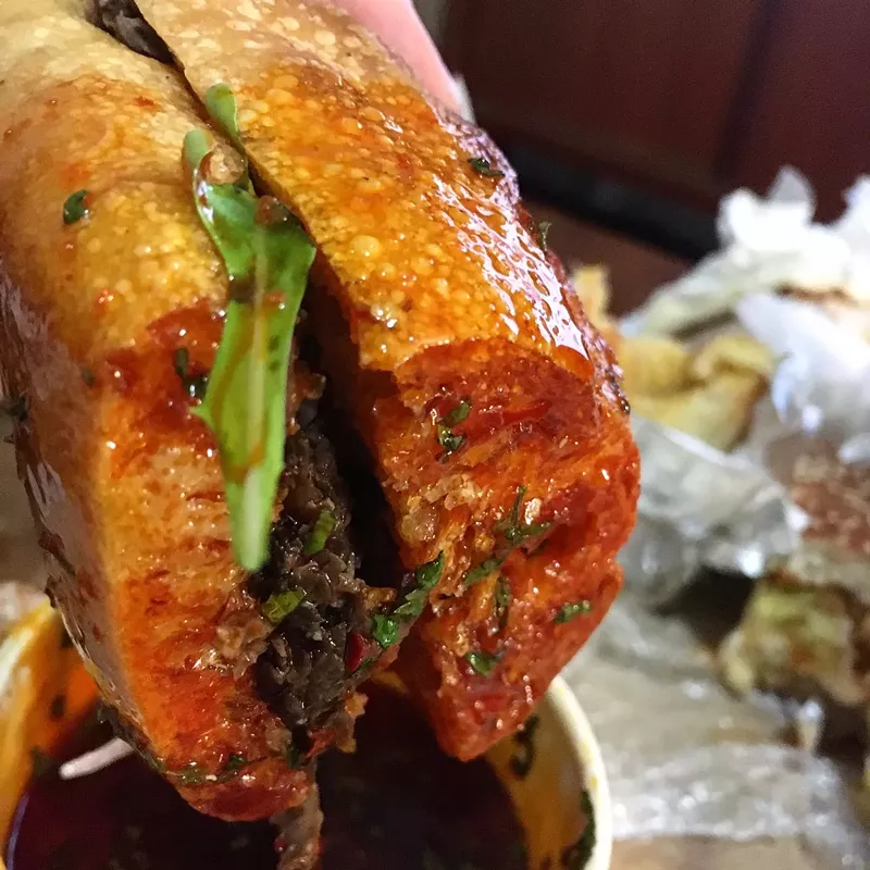 Image: Open's Sichuan short rib sandwich, as designed by Tommy Lee of Uncle and Hop Alley.