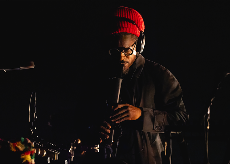 Image: André 3000 performing on the New Blue Sun tour.