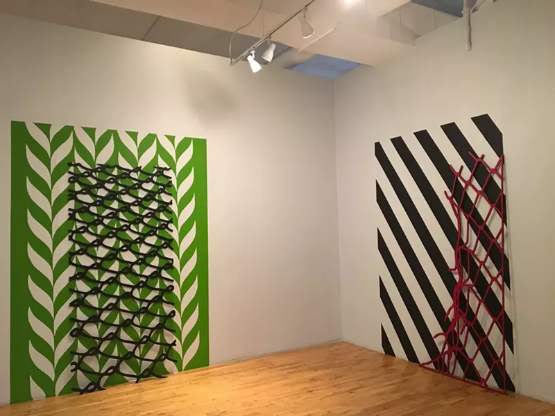 Image: Wall installations by Jaime Carrejo in Espacio Liminal/Liminal Space at the Museo de las Americas.