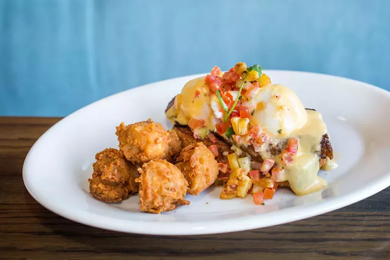 Image: Chipotle Hollandaise and pineapple salsa give the Costa Rica Benedict its unique flavor.