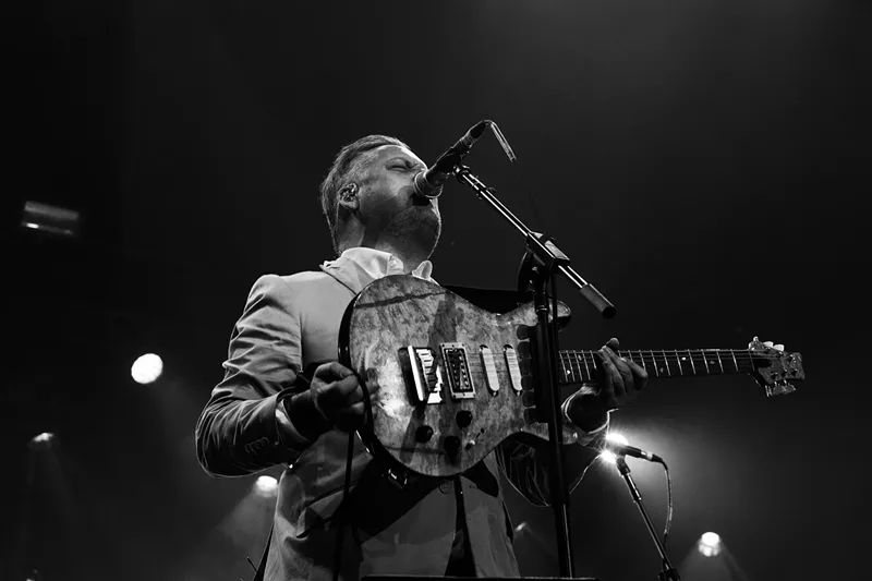 Image: A black and white photo of Modest Mouse