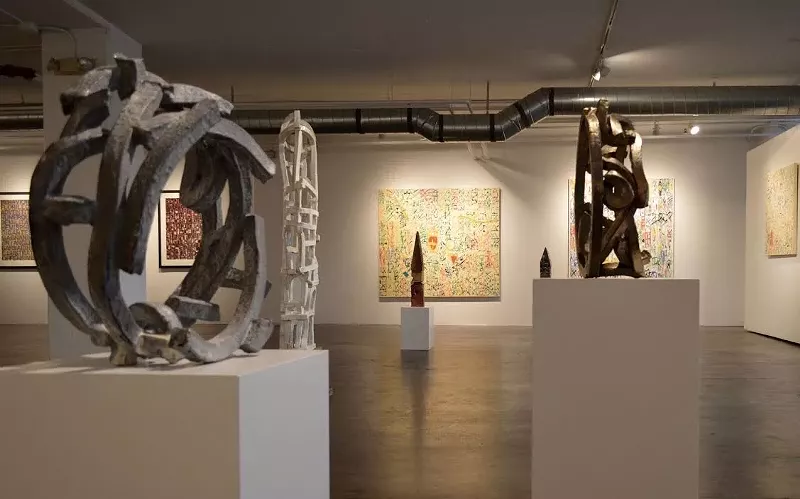 Image: Brandon Reese sculptures and Roland Bernier paintings at Walker Fine Art.