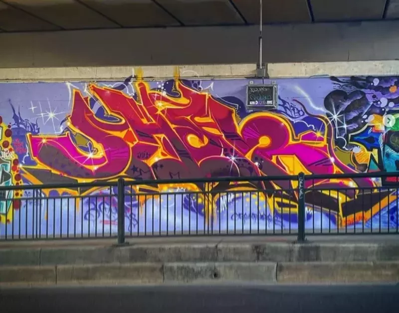 Image: A portion of Jher's mural with RiNo Art District, which was covered up weeks after being installed.
