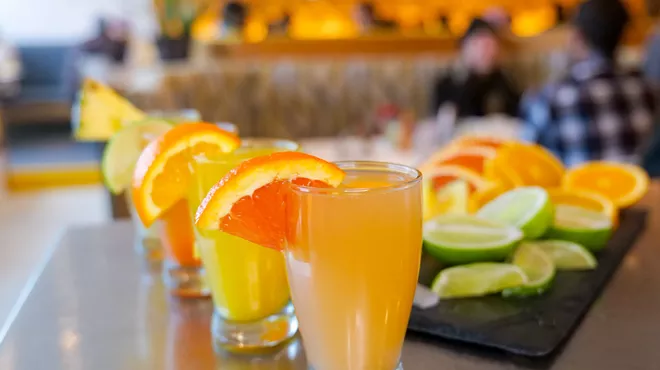 many mimosas and citrus slices