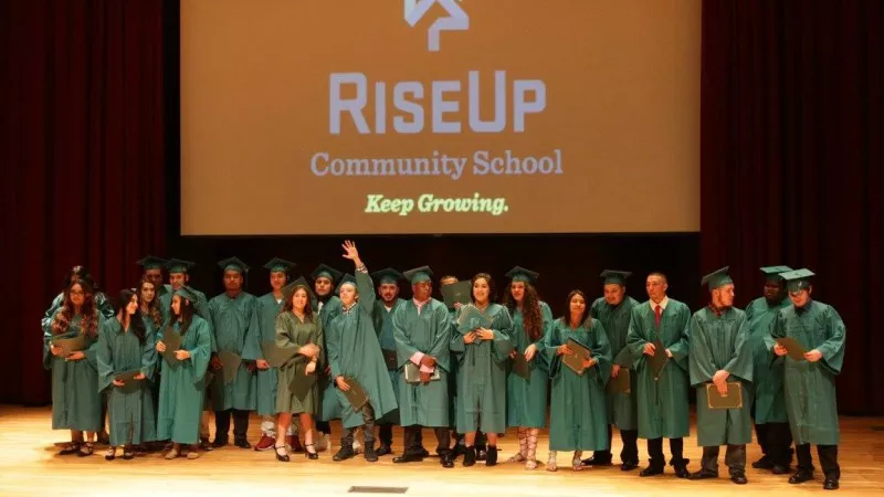 Image: Graduates at a RiseUp Community School ceremony in January.