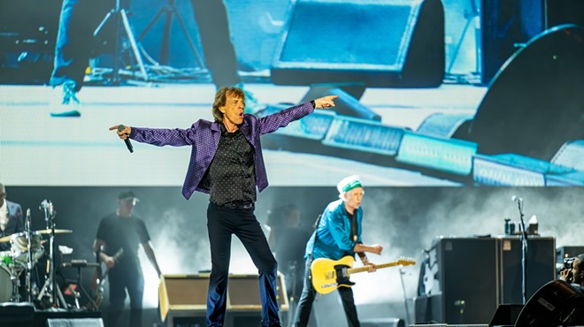 mick jagger of the rolling stones performing at empower field in denver