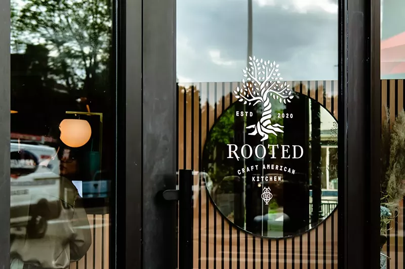 Image: tree logo on a glass door
