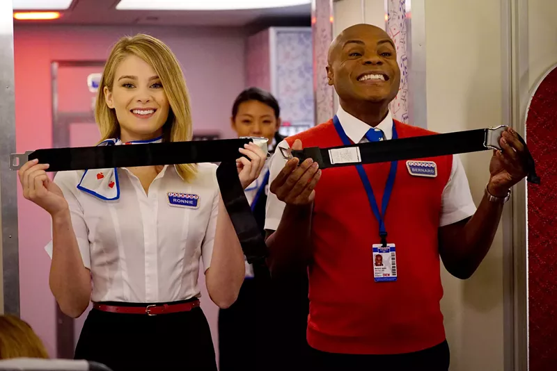 Image: Kim Matula (left) and Nathan Lee Graham are two of the "stars" in LA to Vegas, a workplace comedy about a flight crew that regularly travels the cursed route between the two title towns.