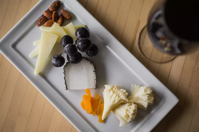 Image: A cheese plate at Truffle Table makes happy hour happy, indeed.