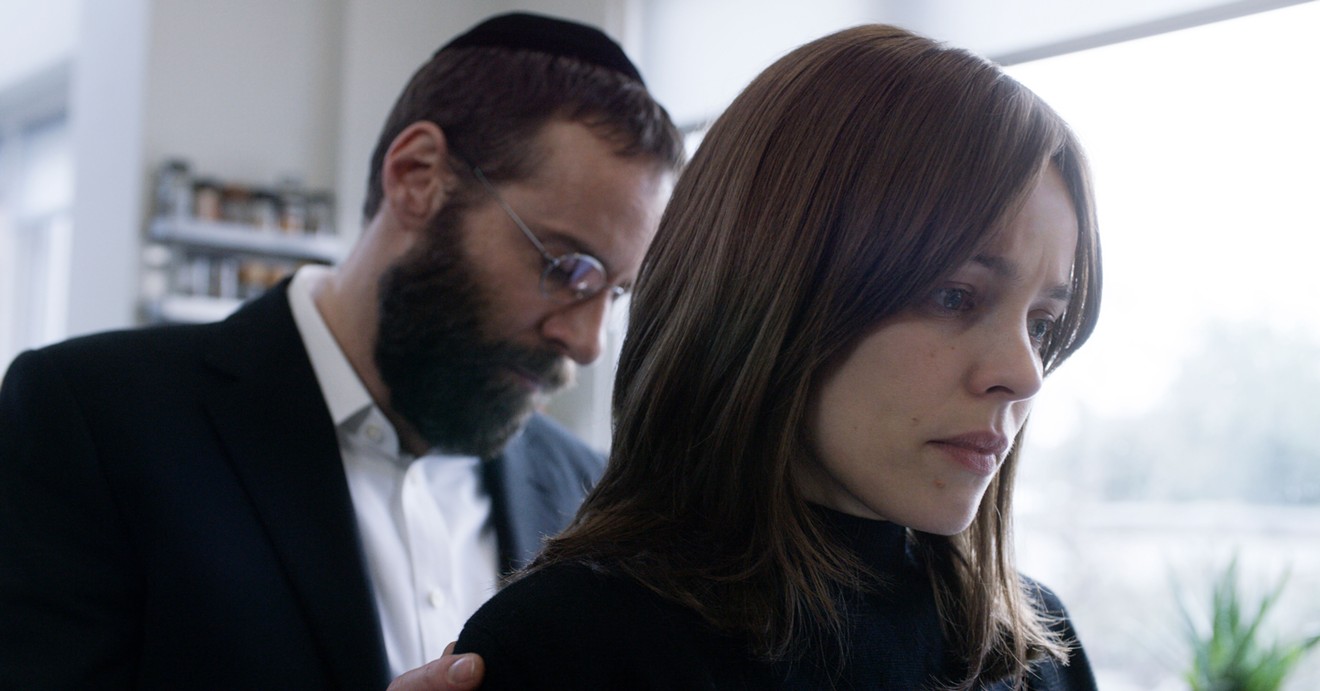 Alessandro Nivola (left) and Rachel McAdams play a husband and wife whose marriage might be threatened after they welcome the return of an old friend in Disobedience, the first English-language film by Sebastian Lelio.