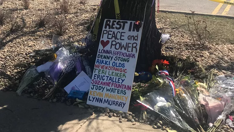 Image: A sign listing the victims' names as seen at the memorial outside the Boulder King Soopers where the March 22 mass shooting took place.