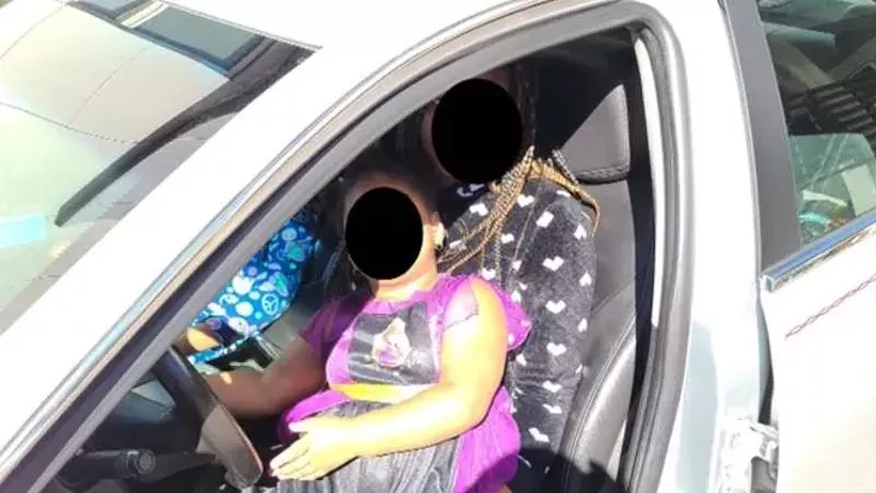 Image: A photo of Naphtali Israel's car occupied by family members whose identities have been disguised to protect their privacy.